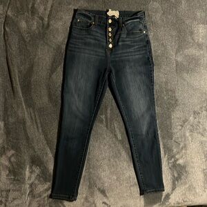 medium to dark blue wash skinny ankle length jeans